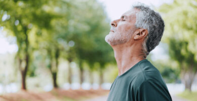 Man breathing outside