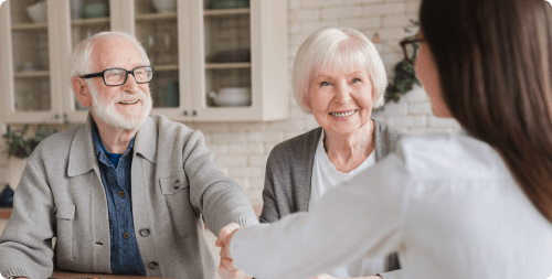 An older man and his wife meet with a mesothelioma laywer