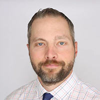 Dr. Travis E. Grotz